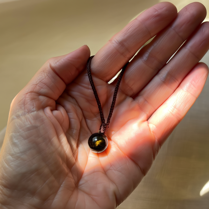 GlowShield™ – Golden Obsidian Energy Pendant