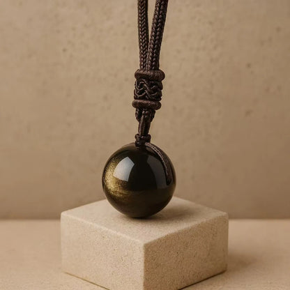 GlowShield™ – Golden Obsidian Energy Pendant
