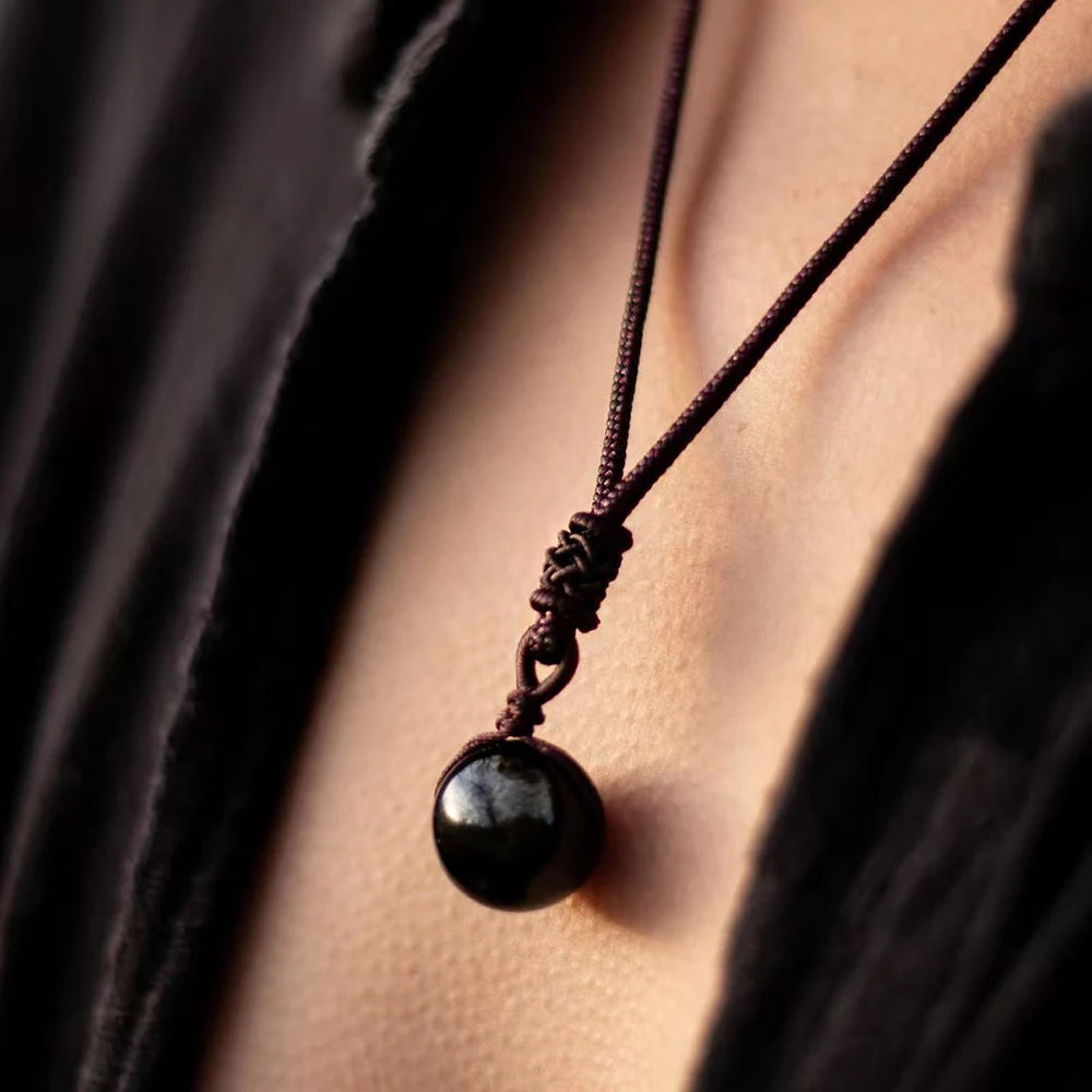 GlowShield™ – Golden Obsidian Energy Pendant