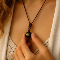 GlowShield™ – Golden Obsidian Energy Pendant