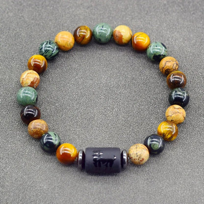 GlowSign™ armband med stjärntecken – naturinspirerade pärlor i jordnära tone